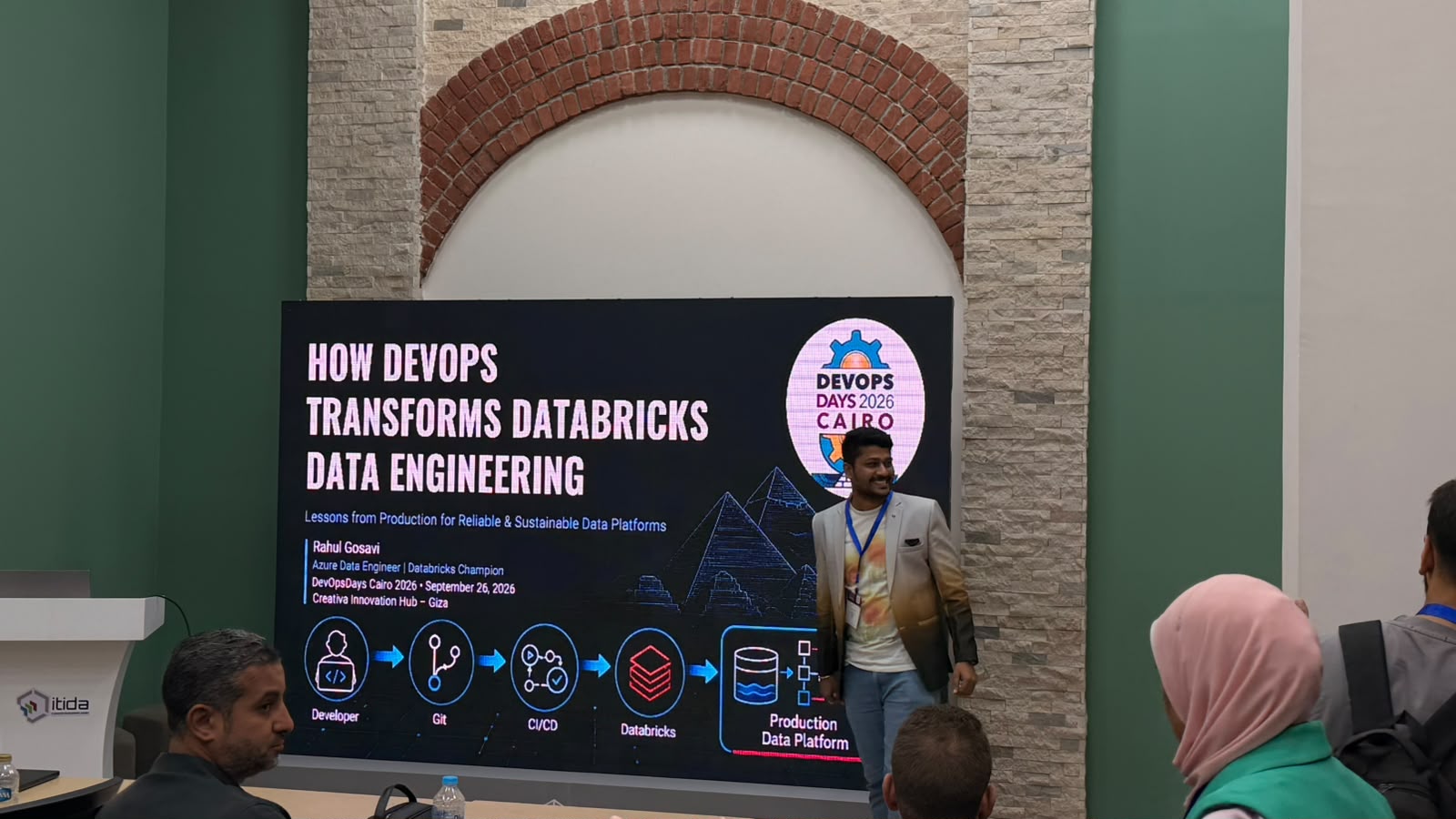 Rahul Gosavi presenting the title slide 'How DevOps Transforms Databricks Data Engineering' at DevOpsDays Cairo 2026